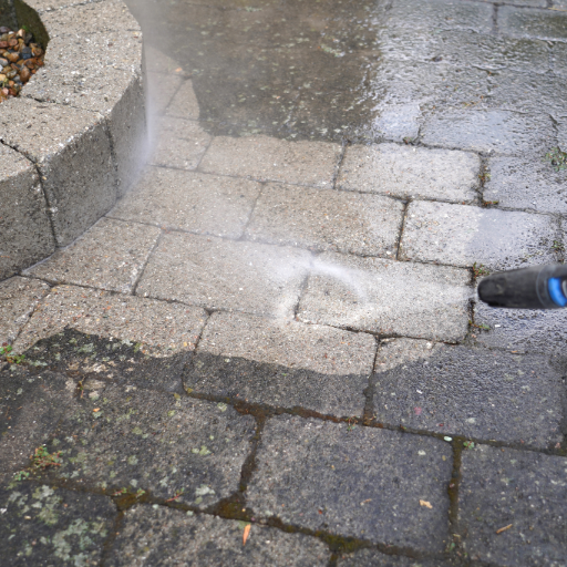 image of pressure washing patio pavers